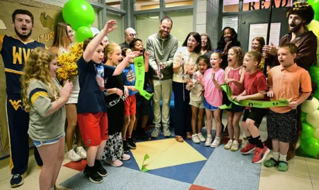 Mylan Park Elementary gets a Big 12 makeover in advance of Arizona game